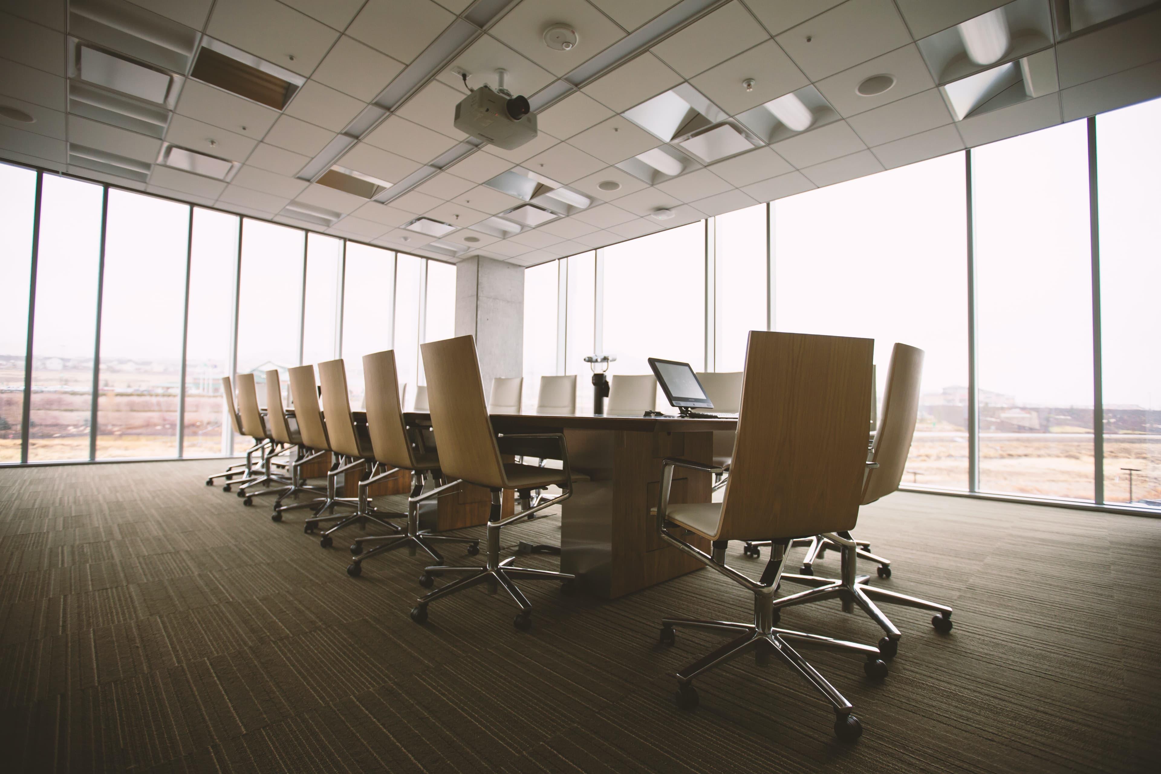 Business team gathered in conference room